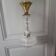 Moulded glass and brass suspension