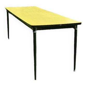 Large yellow and black formica table