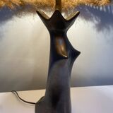 Black glazed ceramic lamp in the shape of a woman attributed to Jacques Bli