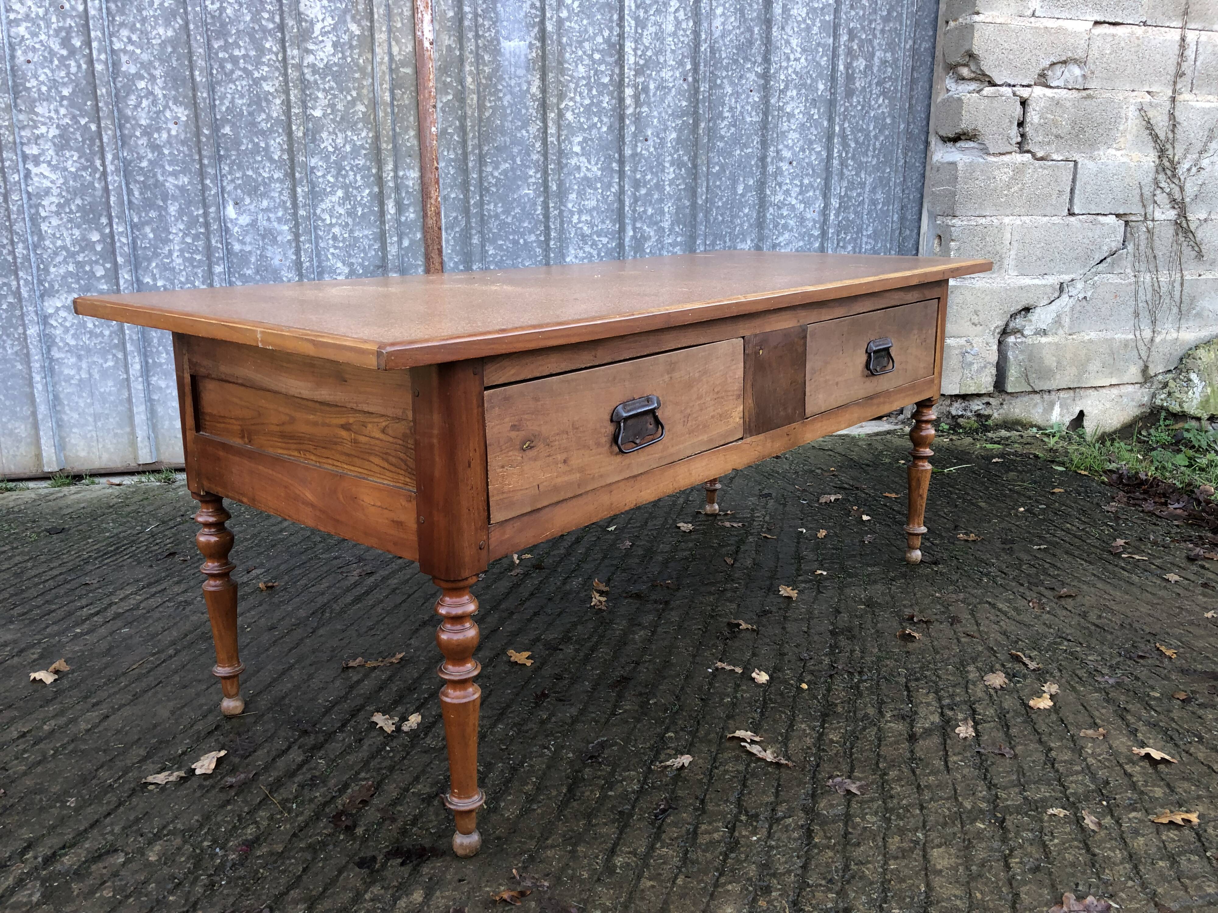 Solid cherry game table with 2 front drawers and panelled crosspieces.