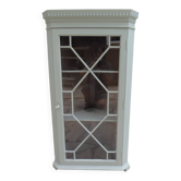 Vintage English corner display cabinet enhanced in grey-green with a wooden top.