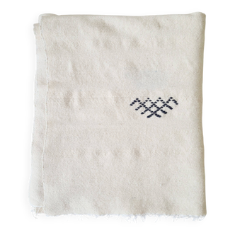Hand-woven ecru wool plaid with black patterns