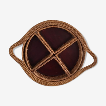 Large wooden and rattan round tray with two handles.