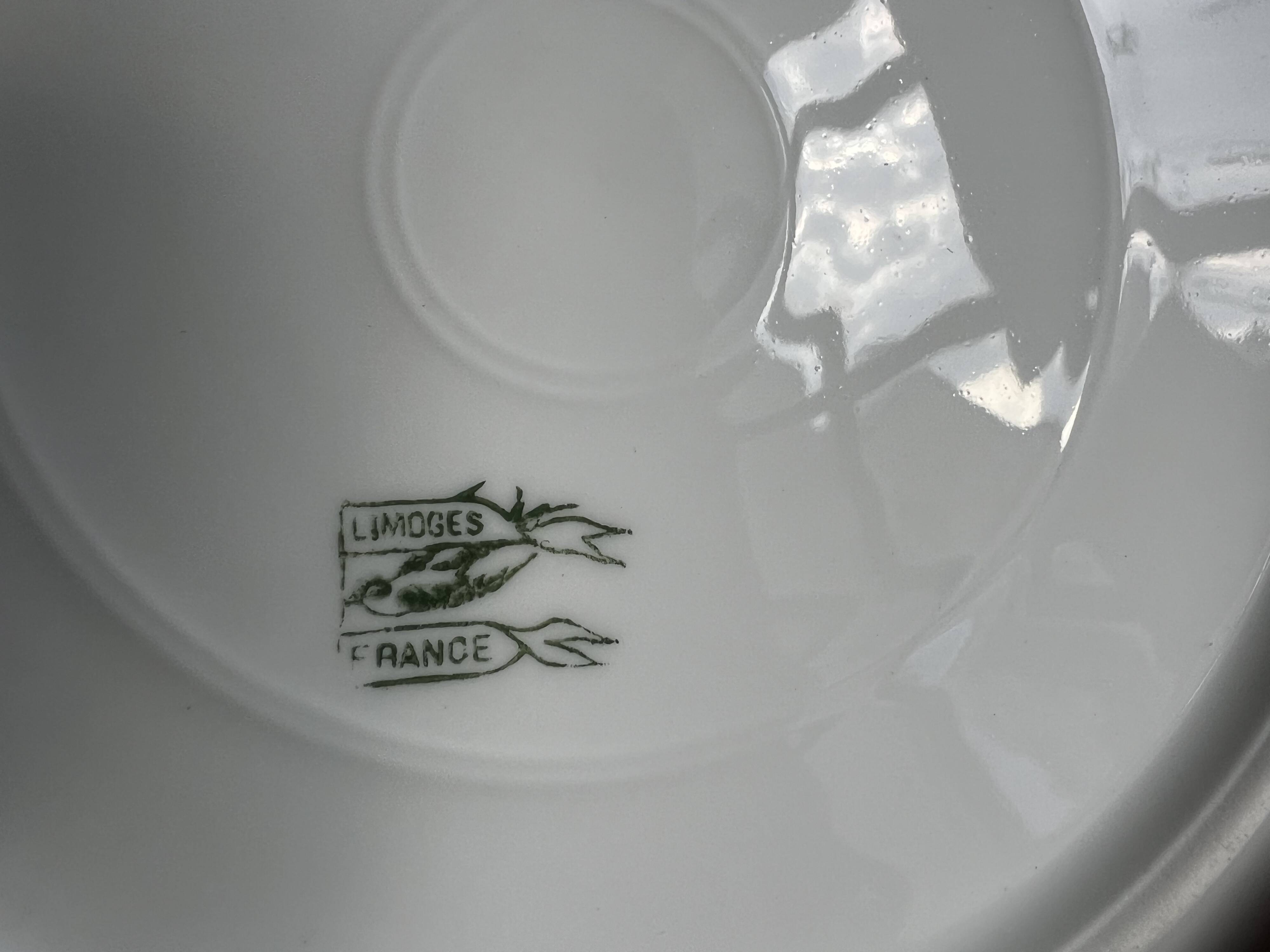 Large Limoges porcelain dinner service – floral decoration and gold trim