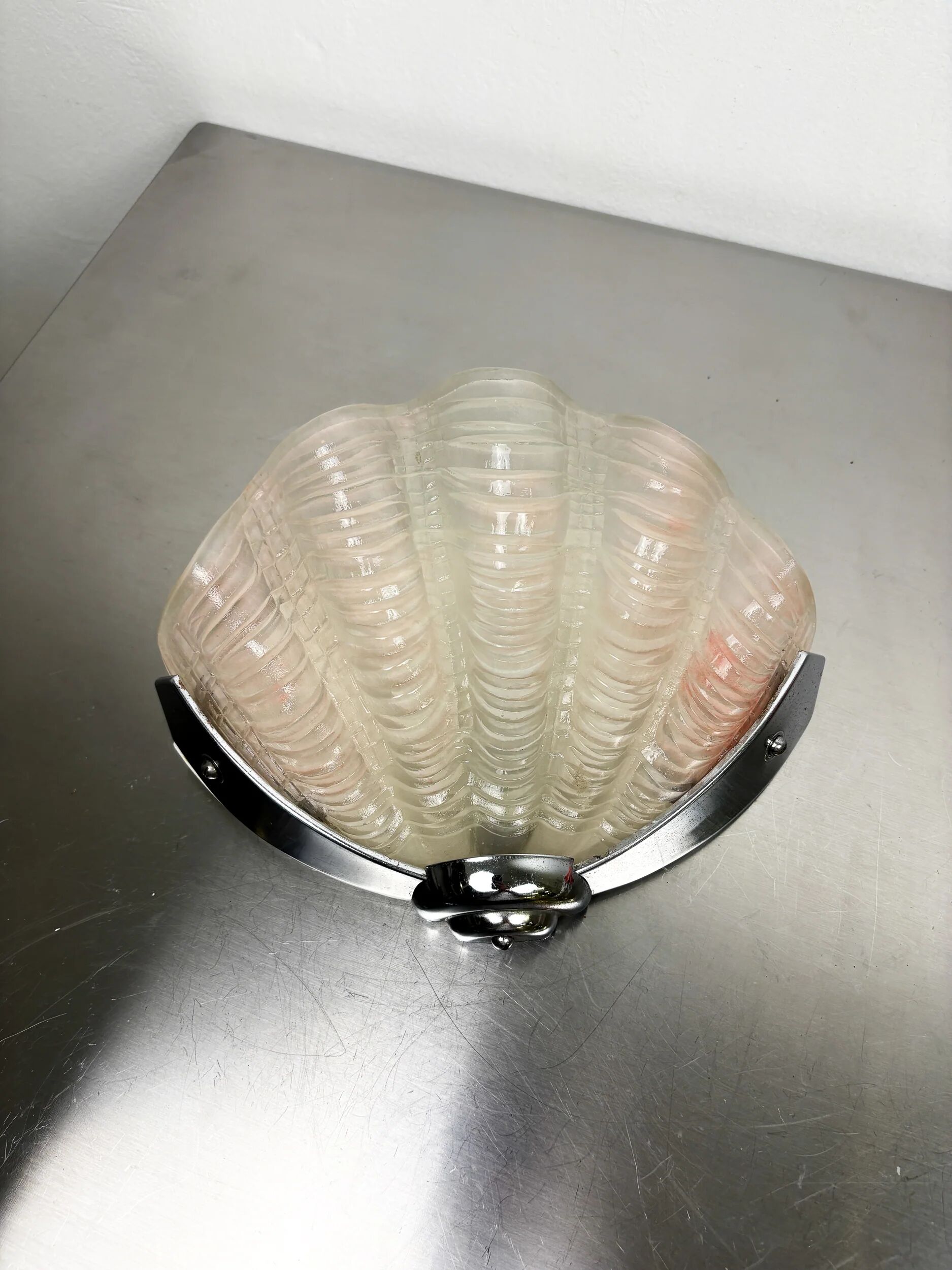 French Art Deco shell wall sconce – amber glass, 1960s