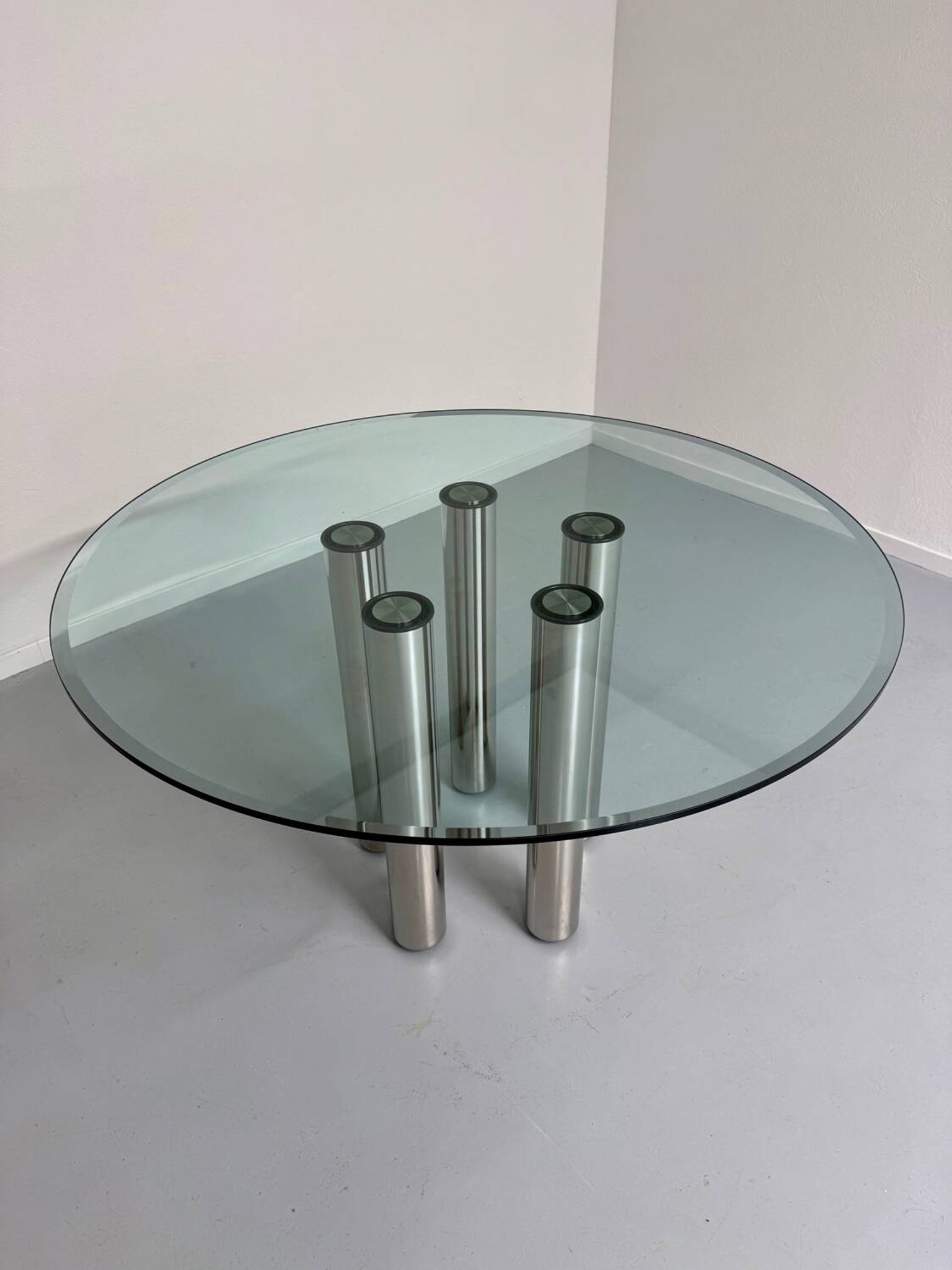 Round glass and metal dining table, Italian design from the 80s, vintage