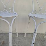 Pair of wrought iron garden chairs, antique manufacture