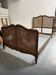 Old wooden and cane bed