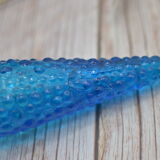 Turquoise blue decanter of 56 centimeters with cap & relief