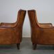Set of two super rugged and very comfortable sheep leather armchairs