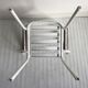 Fauteuil en métal blanc