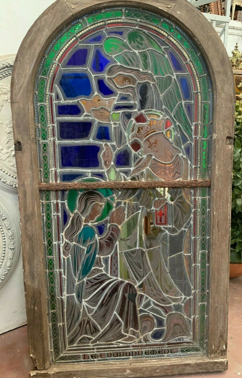 Stained glass panel representing a nineteenth century coronation