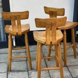 Trio of bent pinewood bar stools
