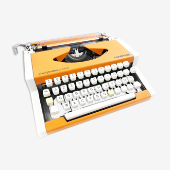 Olympia dactymetal typewriter orange