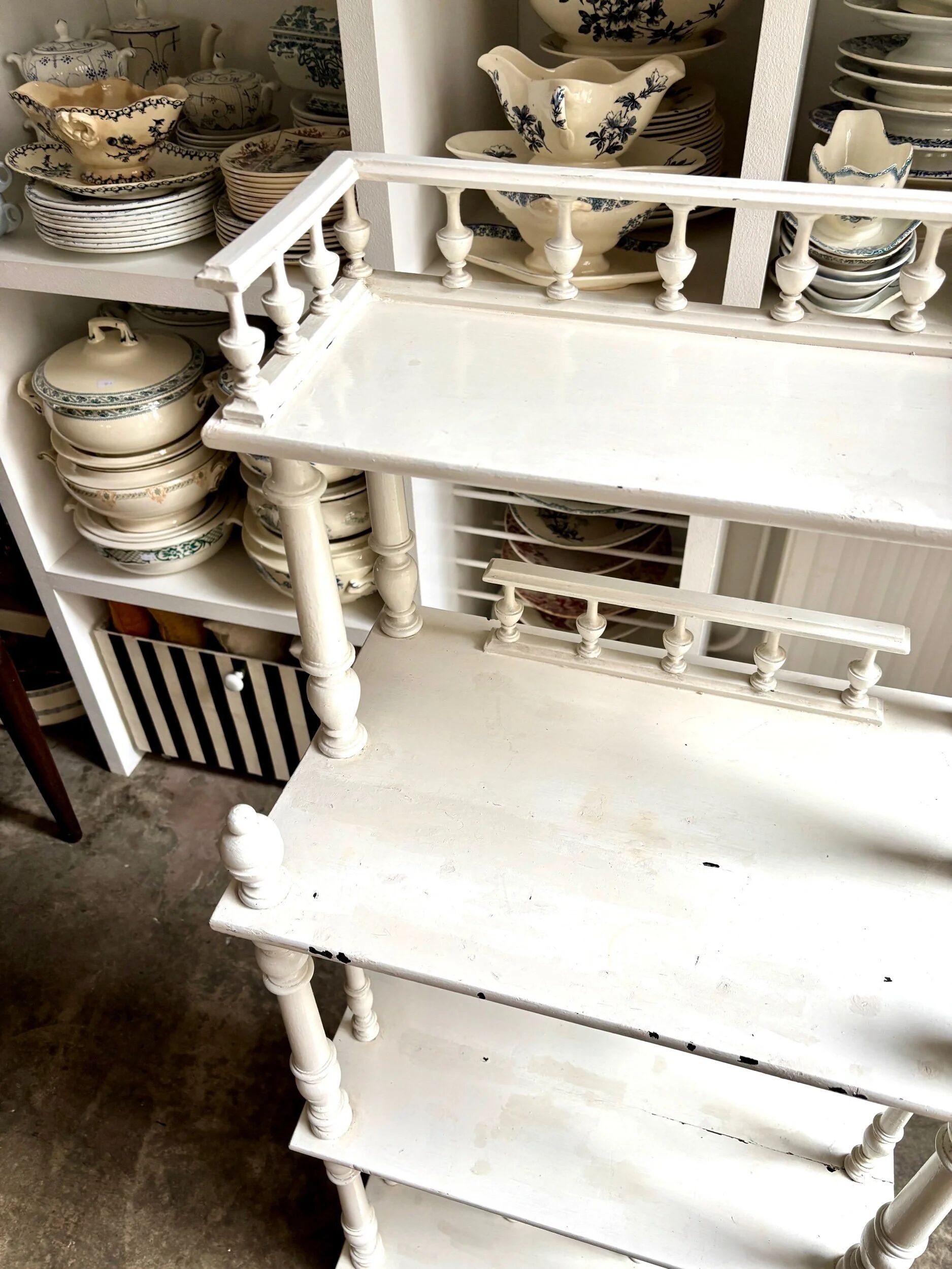 Library, white wooden sheet music cabinet.