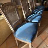 Set of 4 elegant Louis XVI style chairs in cream patinated wood.