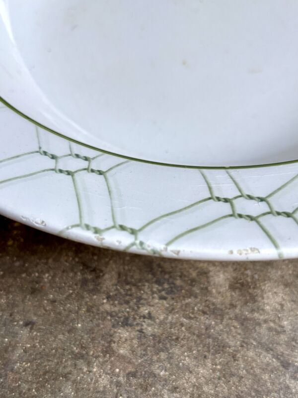 Petit plat rond creux Christian Dior en faïence italienne