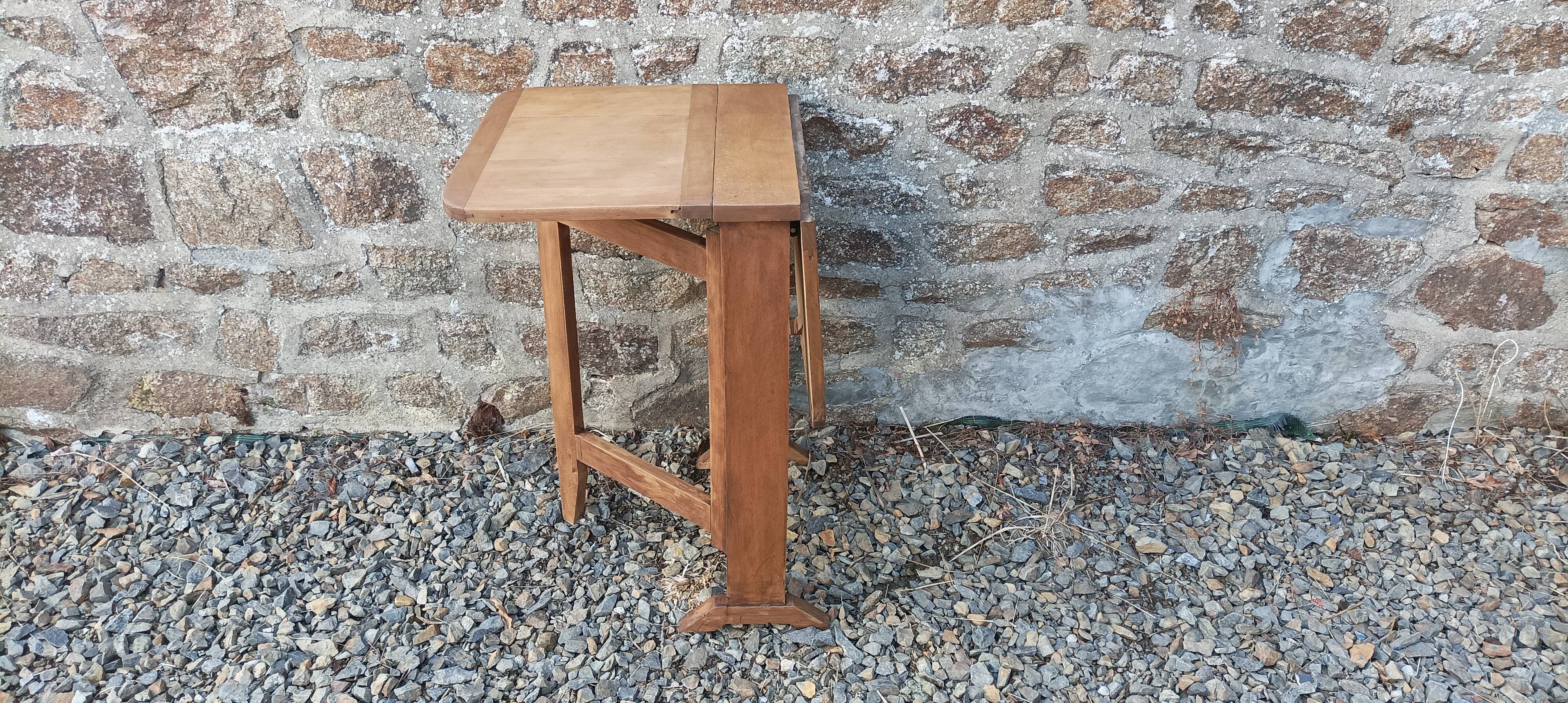 Old wooden table with double swings