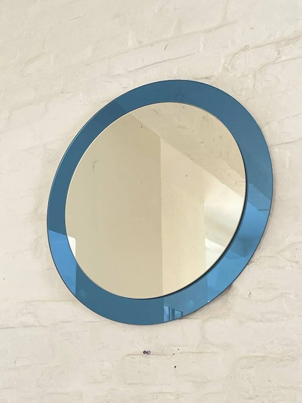 Blue glass wall mirror, Italian, circa 1960s-1970s.
