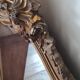 Antique Louis Philippe mirror with a pediment.