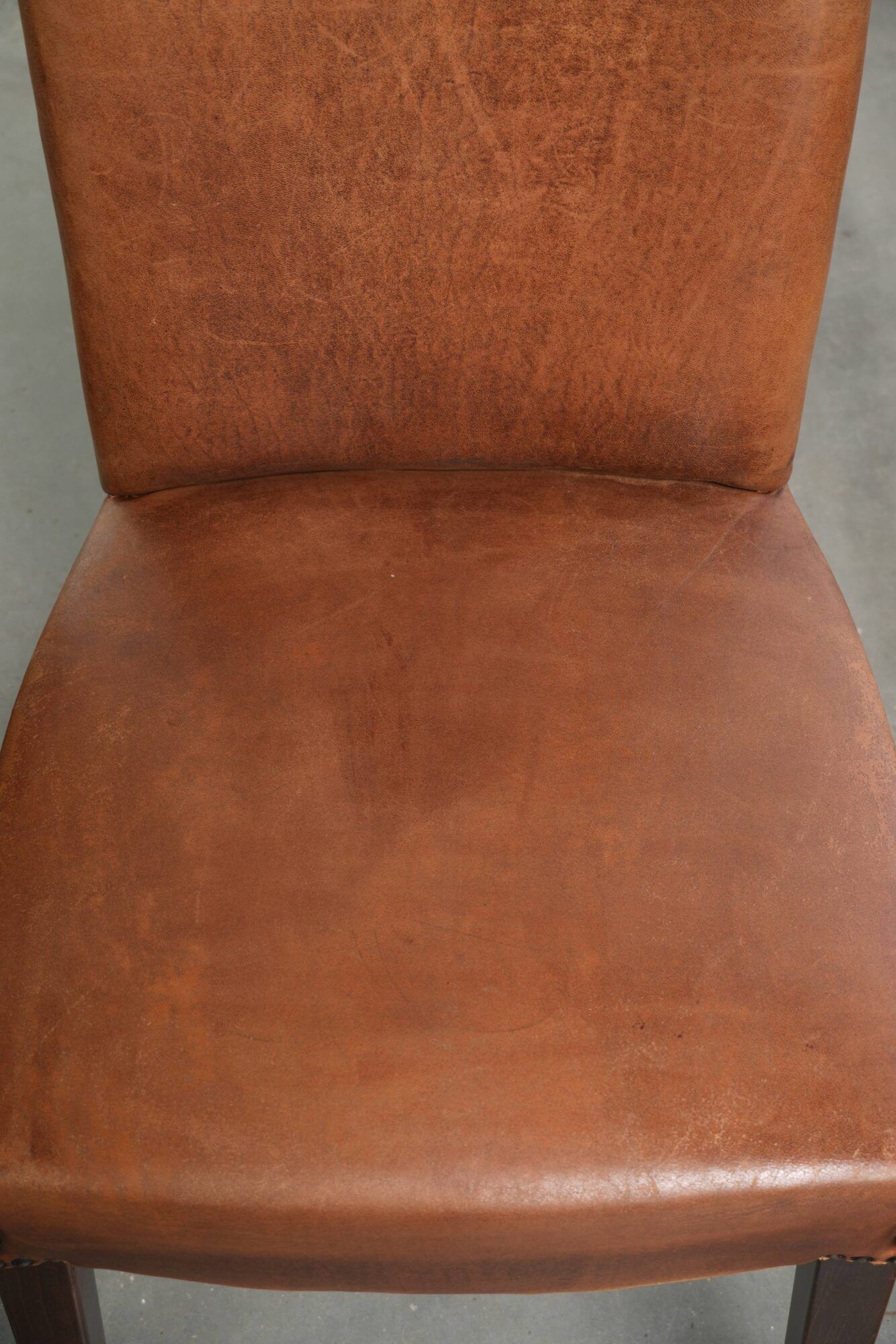 Set of 6 sheepskin dining chairs in a cognac colour with a lovely patina