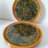 Set of 4 flamed enamel plates in green and amber from the 60s-70s.