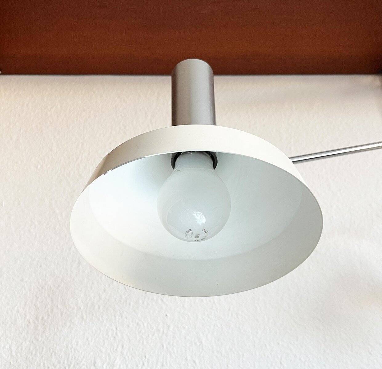 Mid-century minimalist Swiss table lamp with a clamp by Rosemarie and Rico Baltensweiler for Baltensweiler, 1950s.