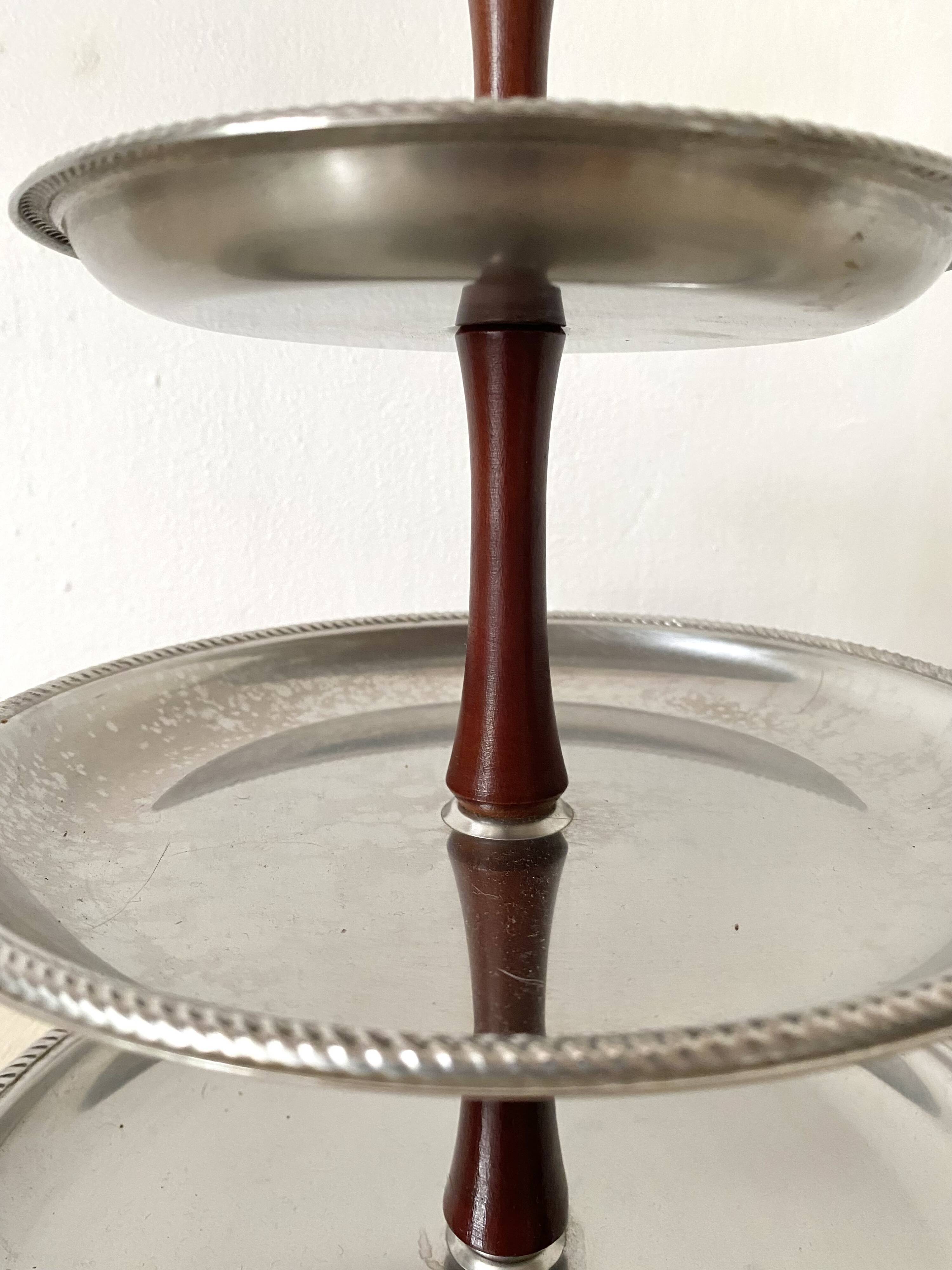 Vintage tiered display stand, stainless steel rotating server Alessi Fratelli