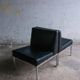 Set of 2 minimalist black leather lounge chairs
