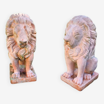 Pair of old terracotta garden lions