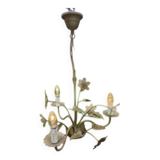 Vintage gold metal chandelier with floral decoration.
