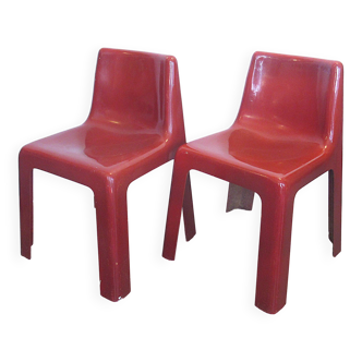 Pair of red fibreglass chairs from the 1970s.