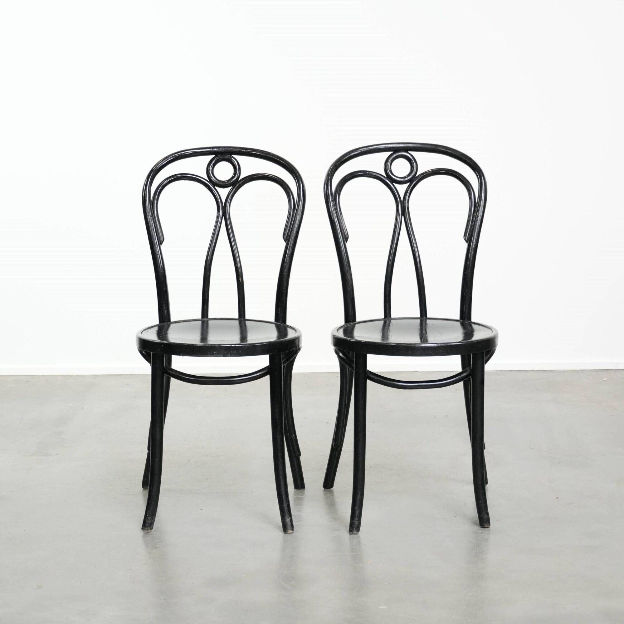 Set of 2 black vintage bistro chairs with an elegant design