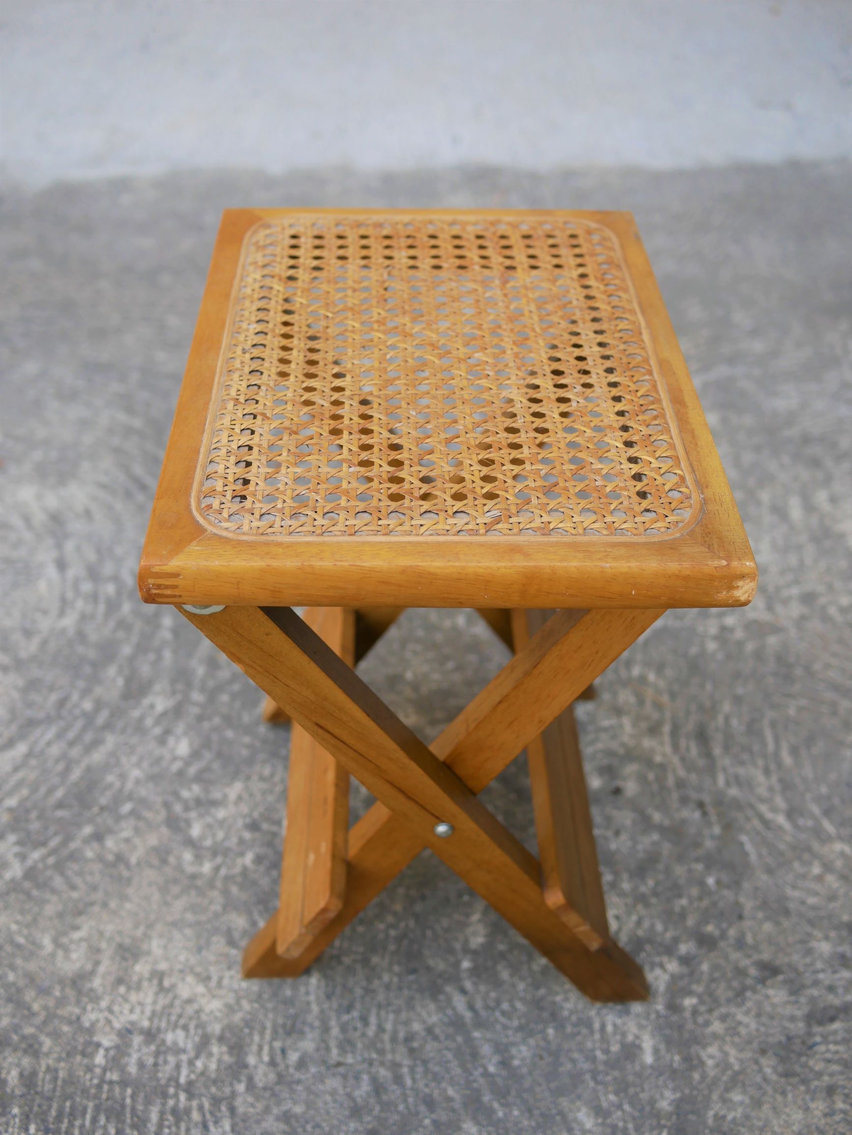 Wooden stool and folding caning