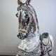 Carved and patinated wooden carousel horse