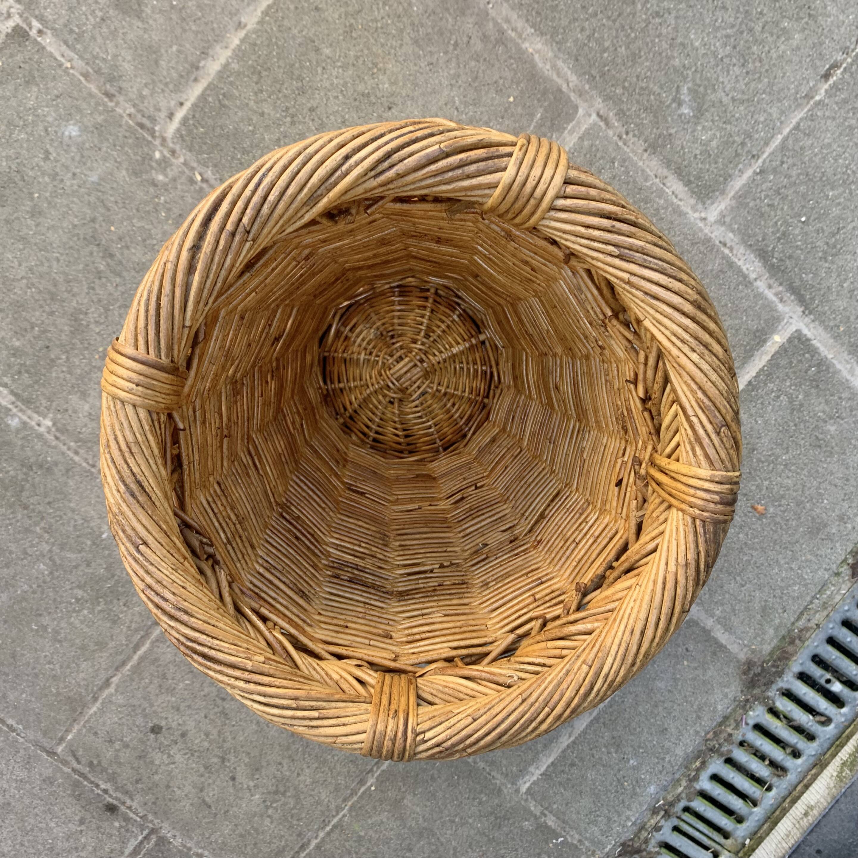 Vintage woven wicker umbrella stand