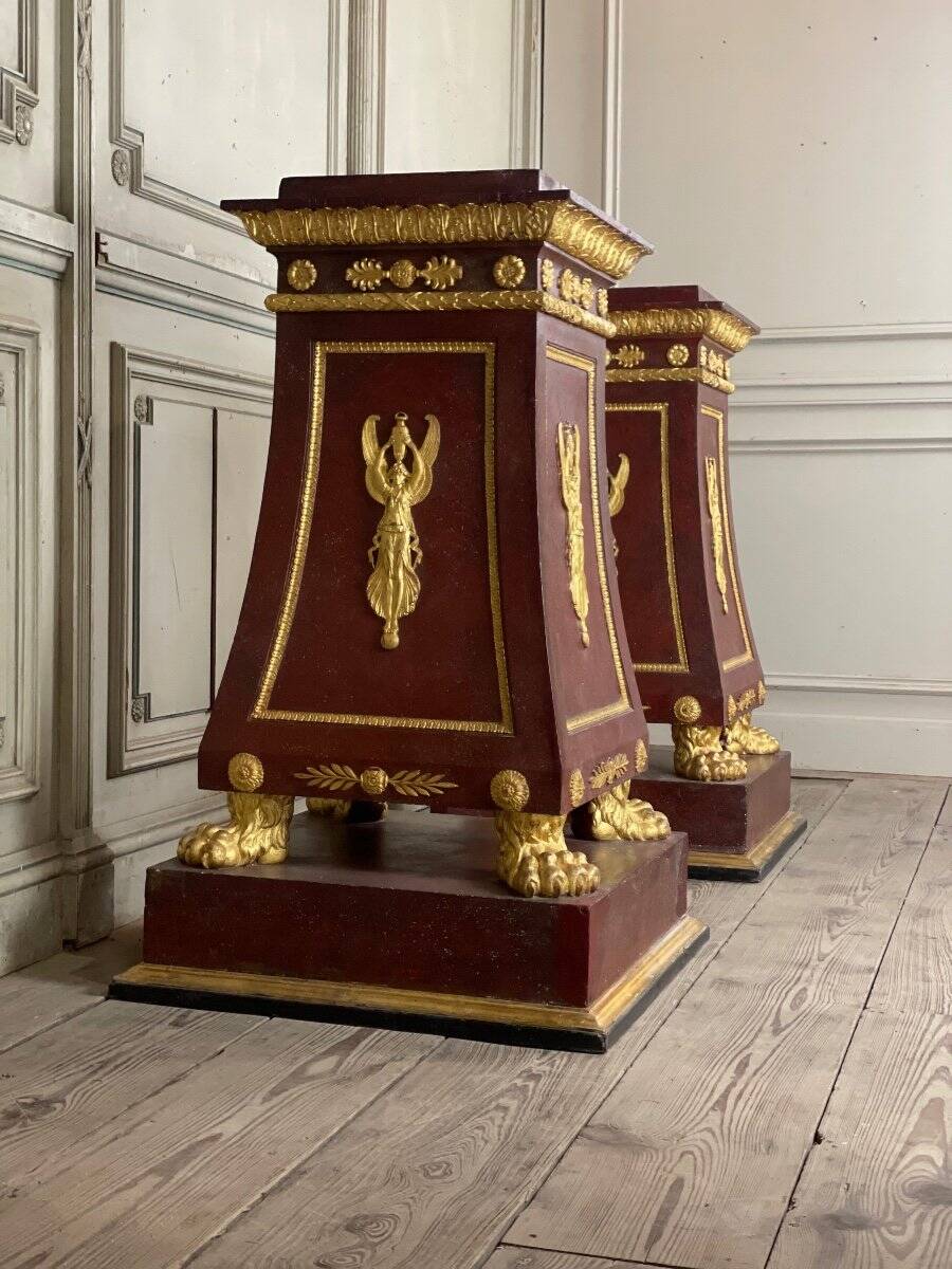 Pair of plaster bases imitating porphyry and gilded bronze circa 1980.