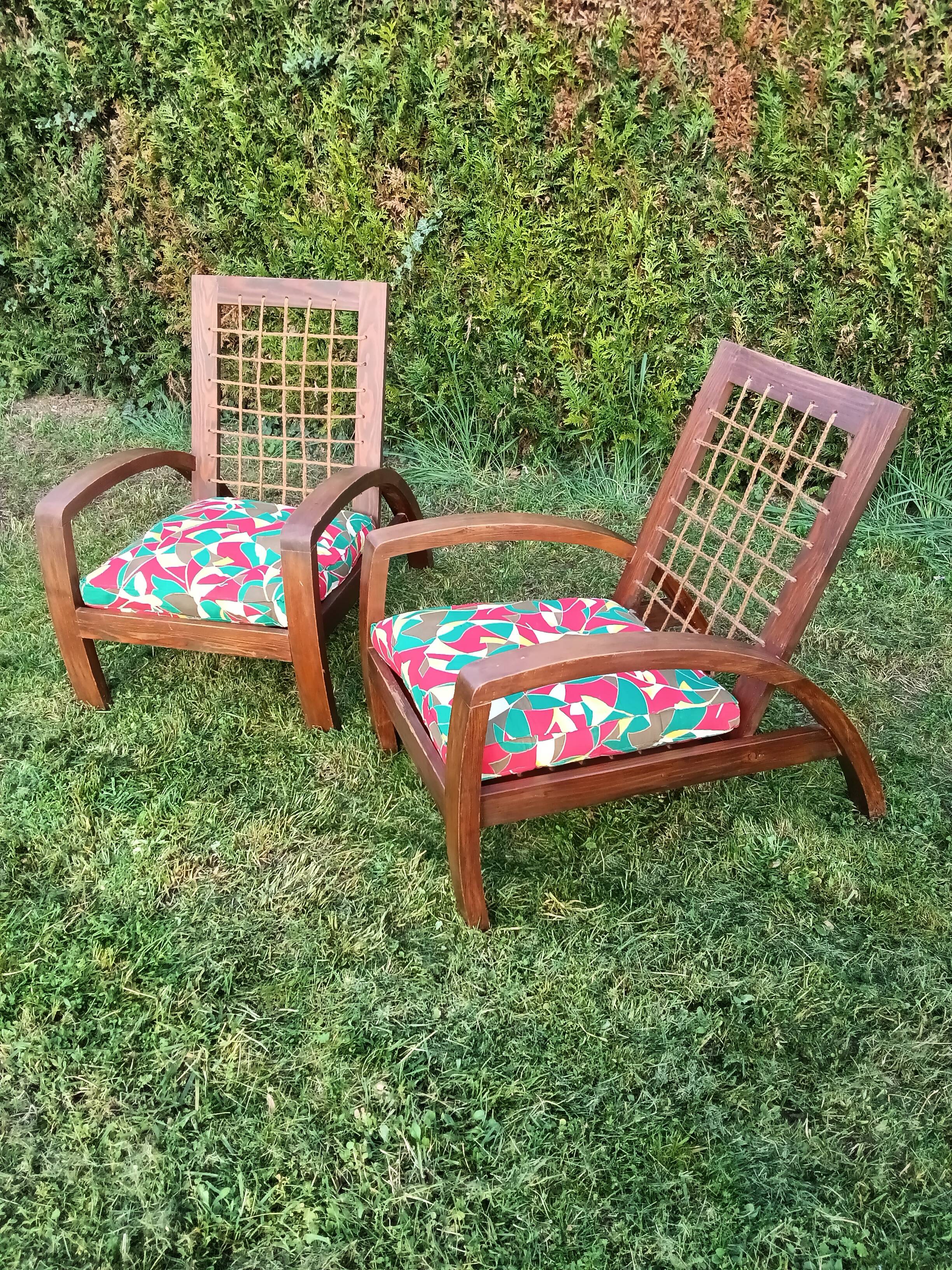 A pair of vintage rope and wood armchairs