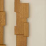 Pair of handcrafted Modernist wall lights in solid wood (oak) Circa 1980