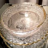 Butter dish or candy dish in pressed glass molded with golden rim