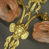 Pair of sconces with the heads of Zephyr Louis XVI style