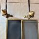Gold wrought iron andiron and log holder for fireplace with grate