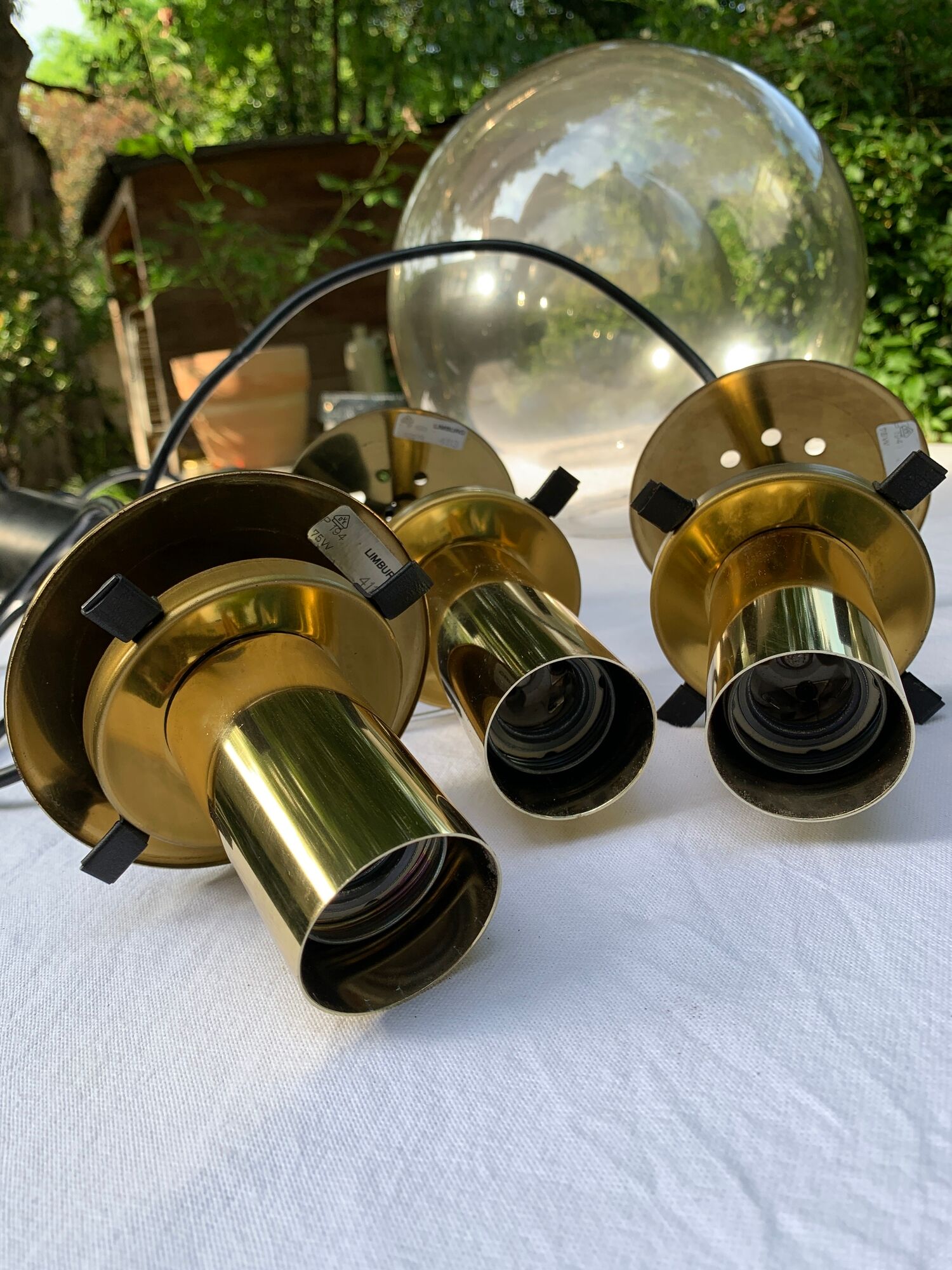 Set of three suspensions in glass and brass Limburg 70s
