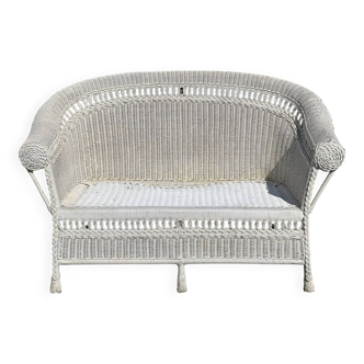 White rattan sofa