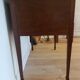 English wooden desk on top of leather