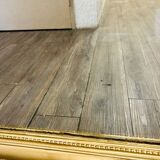 Antique gilded mirror in old Louis Philippe wood