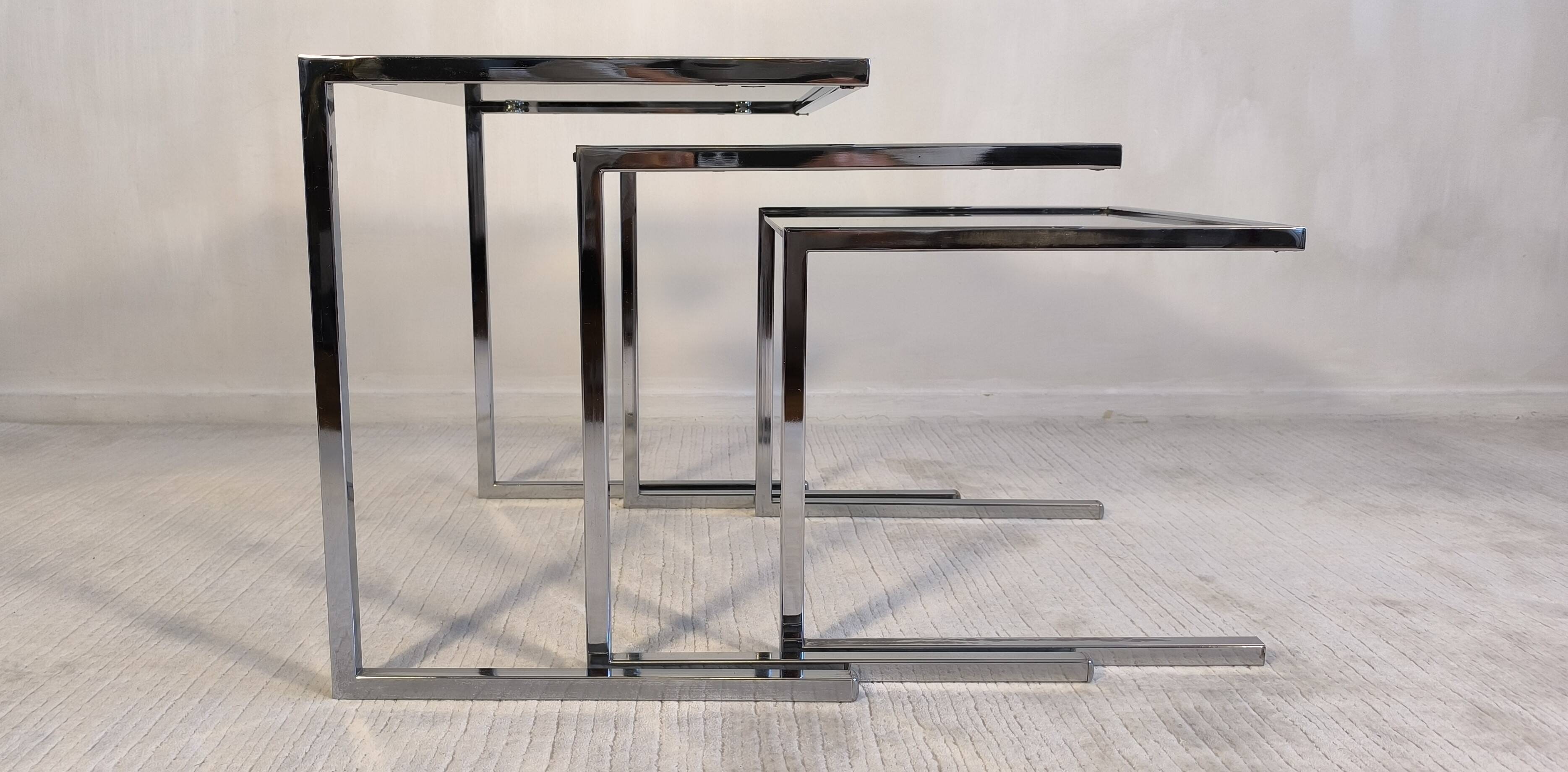 Set of 3 vintage nesting tables in chrome and smoked glass, Roche Bobois style.