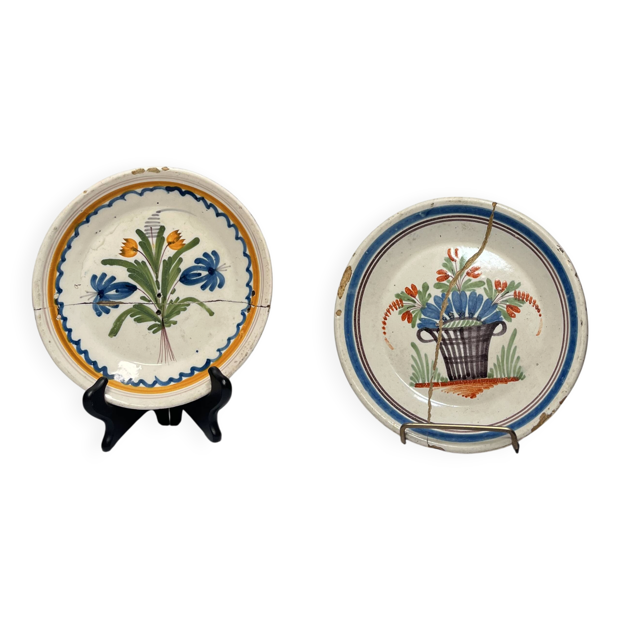 Two antique 18th-century faience plates, stapled.