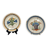 Two antique 18th-century faience plates, stapled.