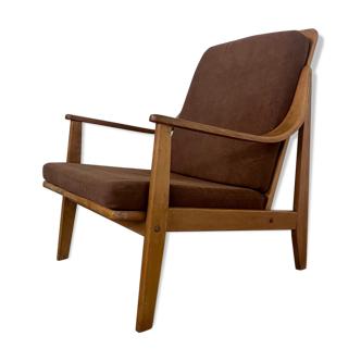 Old Scandinavian designer armchair from the 60s in vintage solid beech